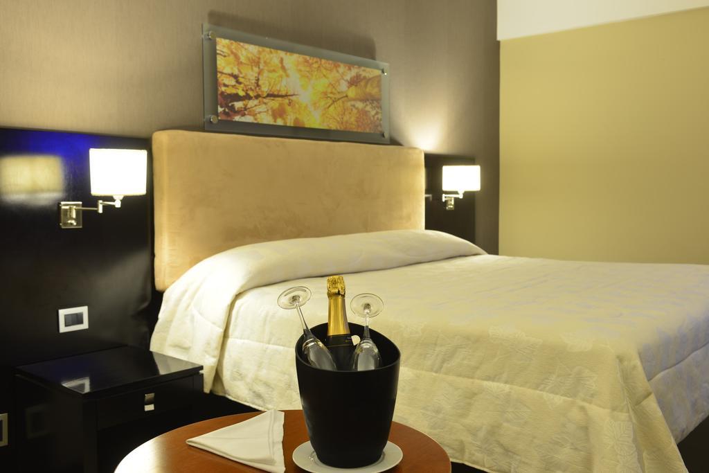 Howard Johnson Plaza Resort Luján Room photo